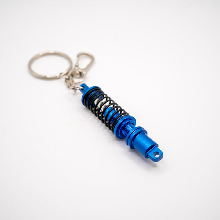 Llavero con suspensión coilover