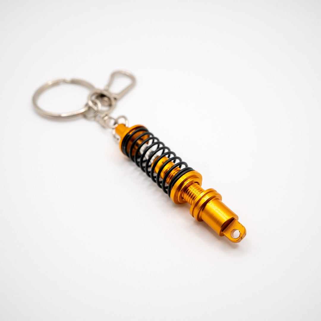 Llavero con suspensión coilover